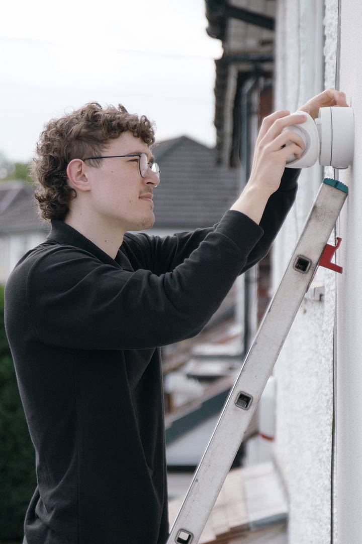 Home Security Manchester installer in action